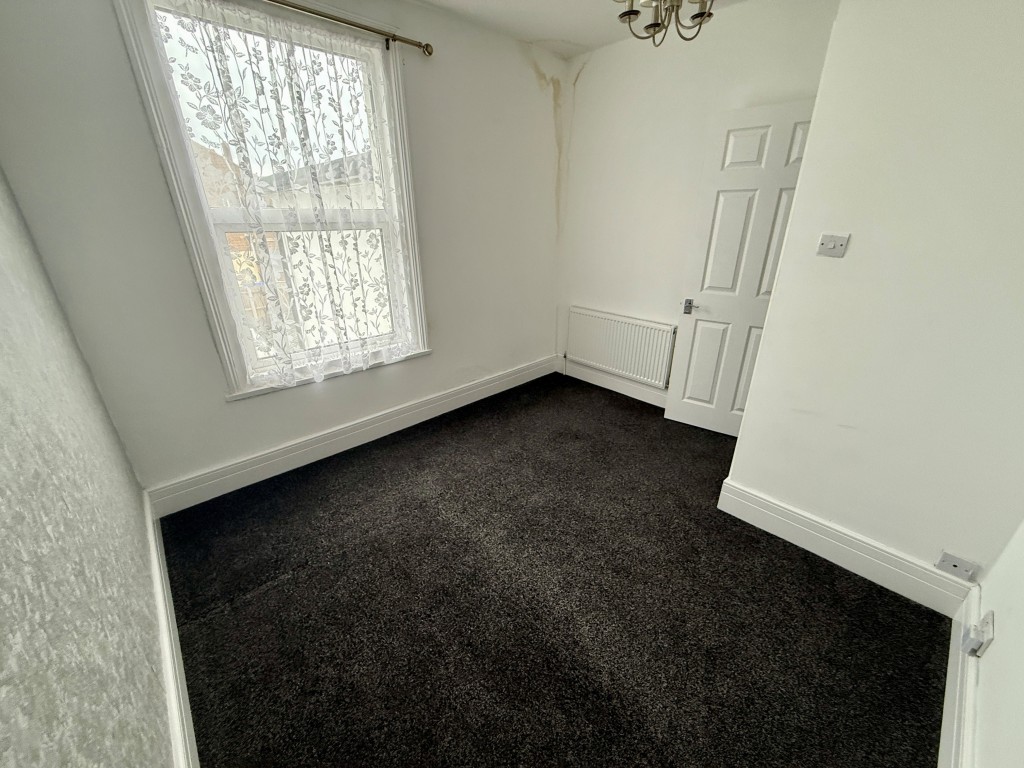 Lot: 110 - THREE-BEDROOM TERRACE HOUSE - Bedroom two